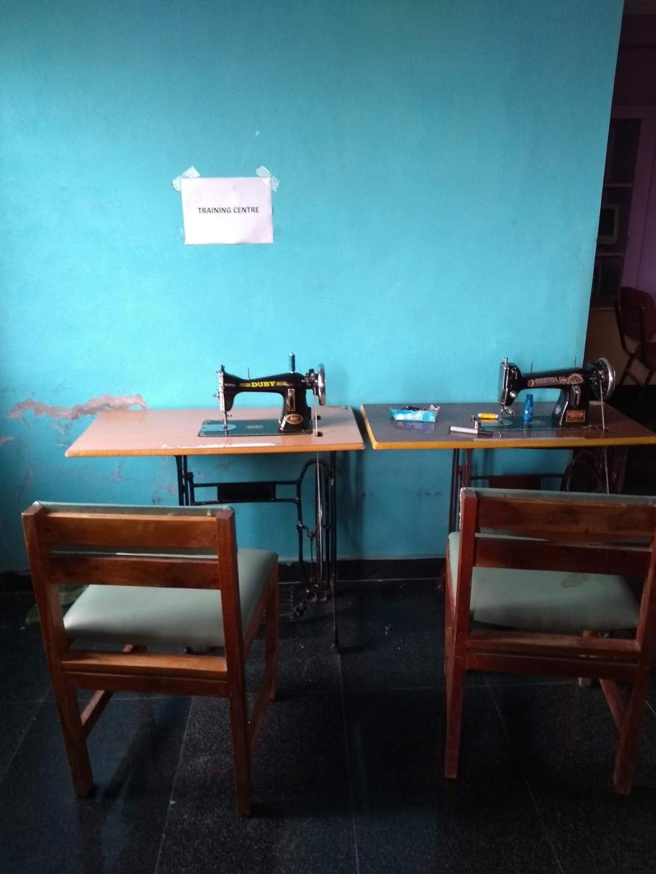 Sewing machines on tables in a rehabilitation training centre